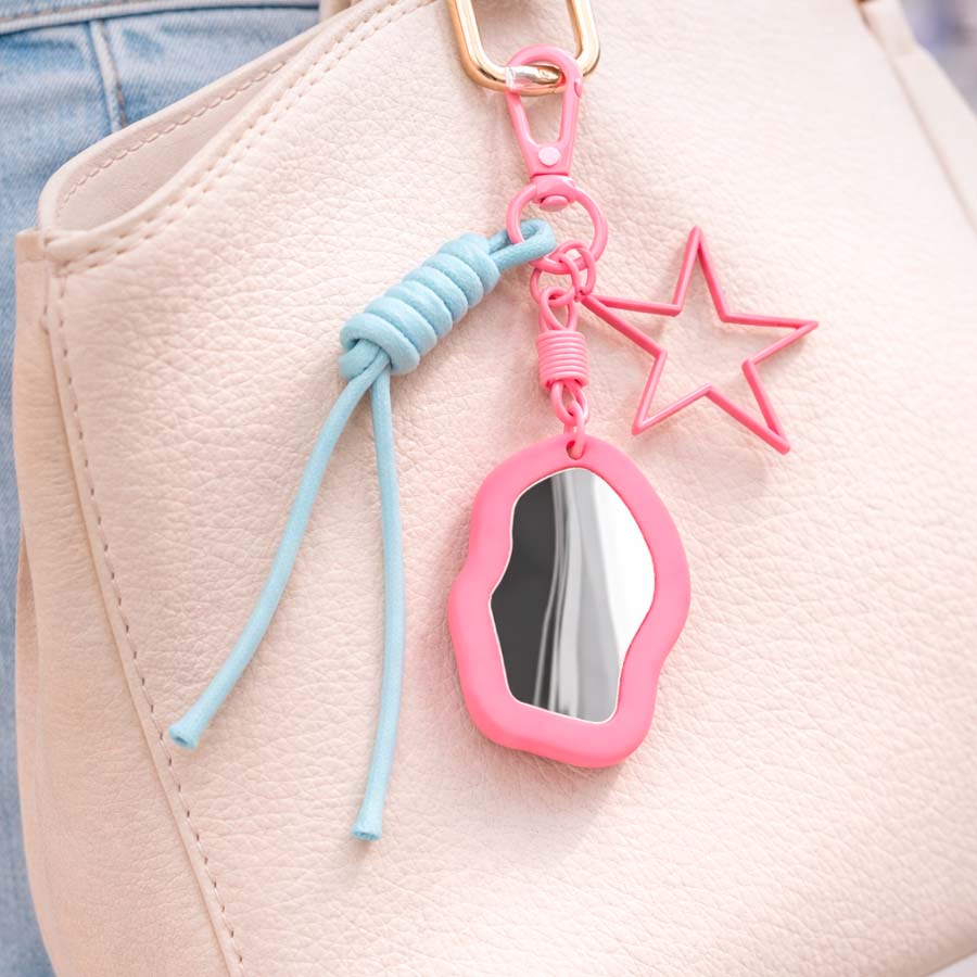 Charm colgante soporte espejo enganchado a bolso